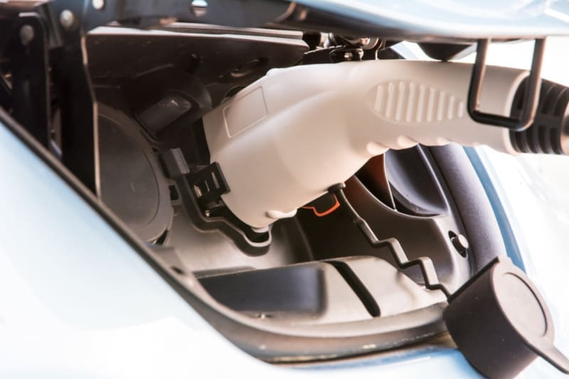 charger plugged into an electric car