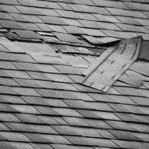 damaged-roof-solar shingles solar panels